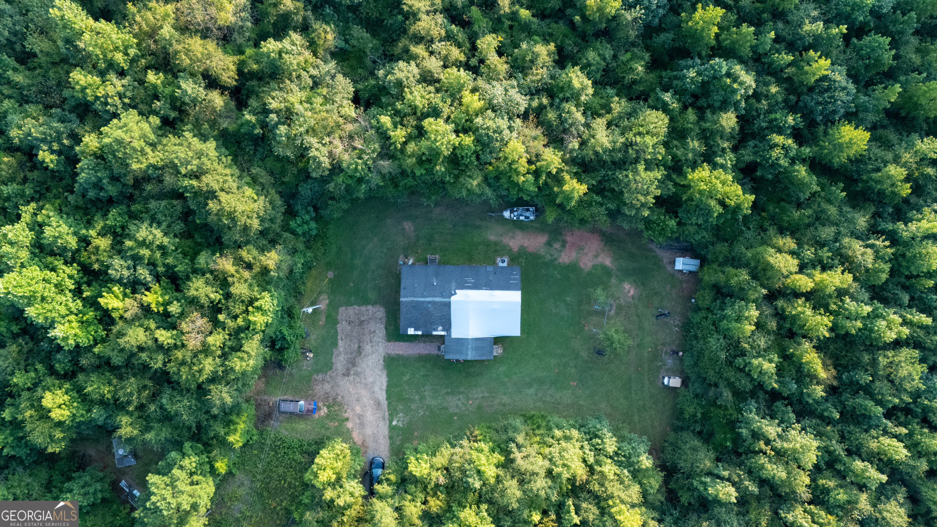 137 Robertson Road LaGrange, GA 30241 - Photo 1 of 5 an aerial view of a house with a yard