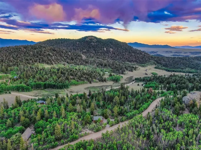 a view of a lake with mountains in the background