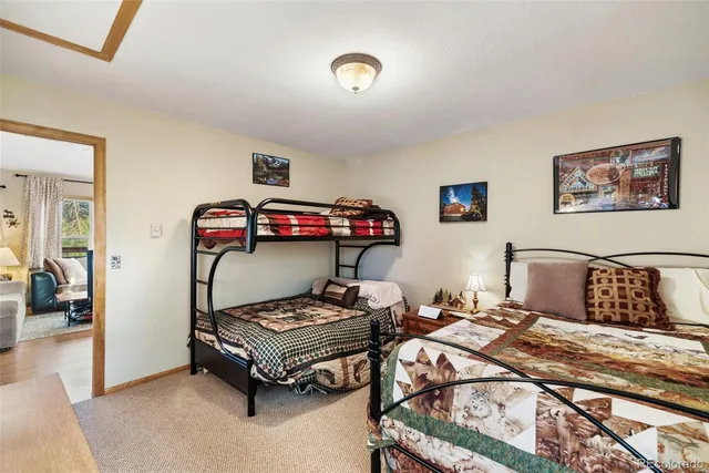 a bedroom with furniture and a bed