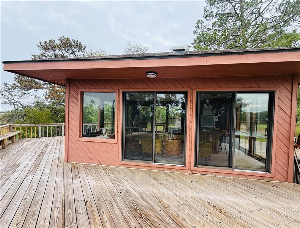 1525 Black Island Road Darien, GA 31305 - Photo 35 of 41 a view of a house with porch and wooden floor