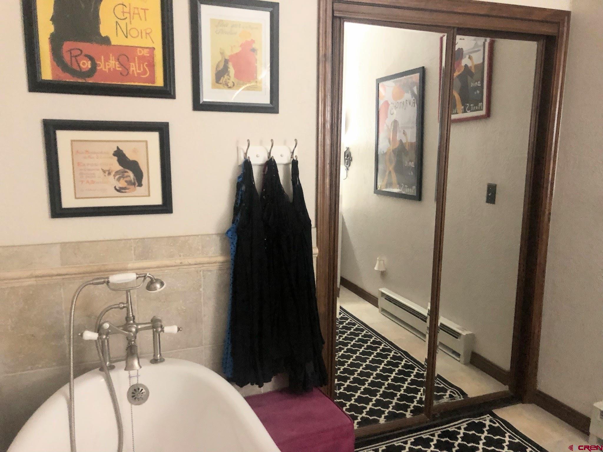202 County Road 20 South Fork, CO 81154 - Photo 11 of 26 a bathroom with a sink and a mirror
