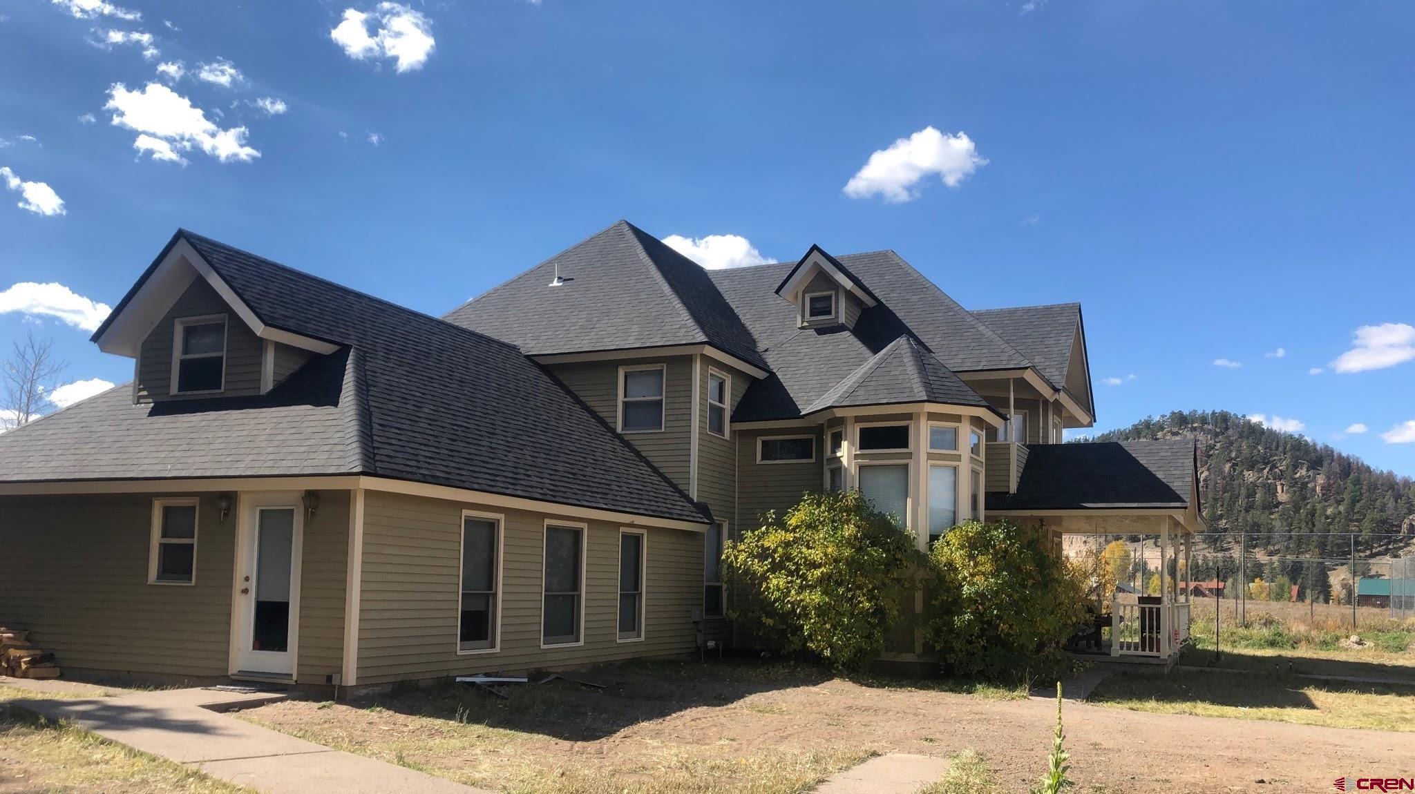 202 County Road 20 South Fork, CO 81154 - Photo 12 of 26 a front view of a house