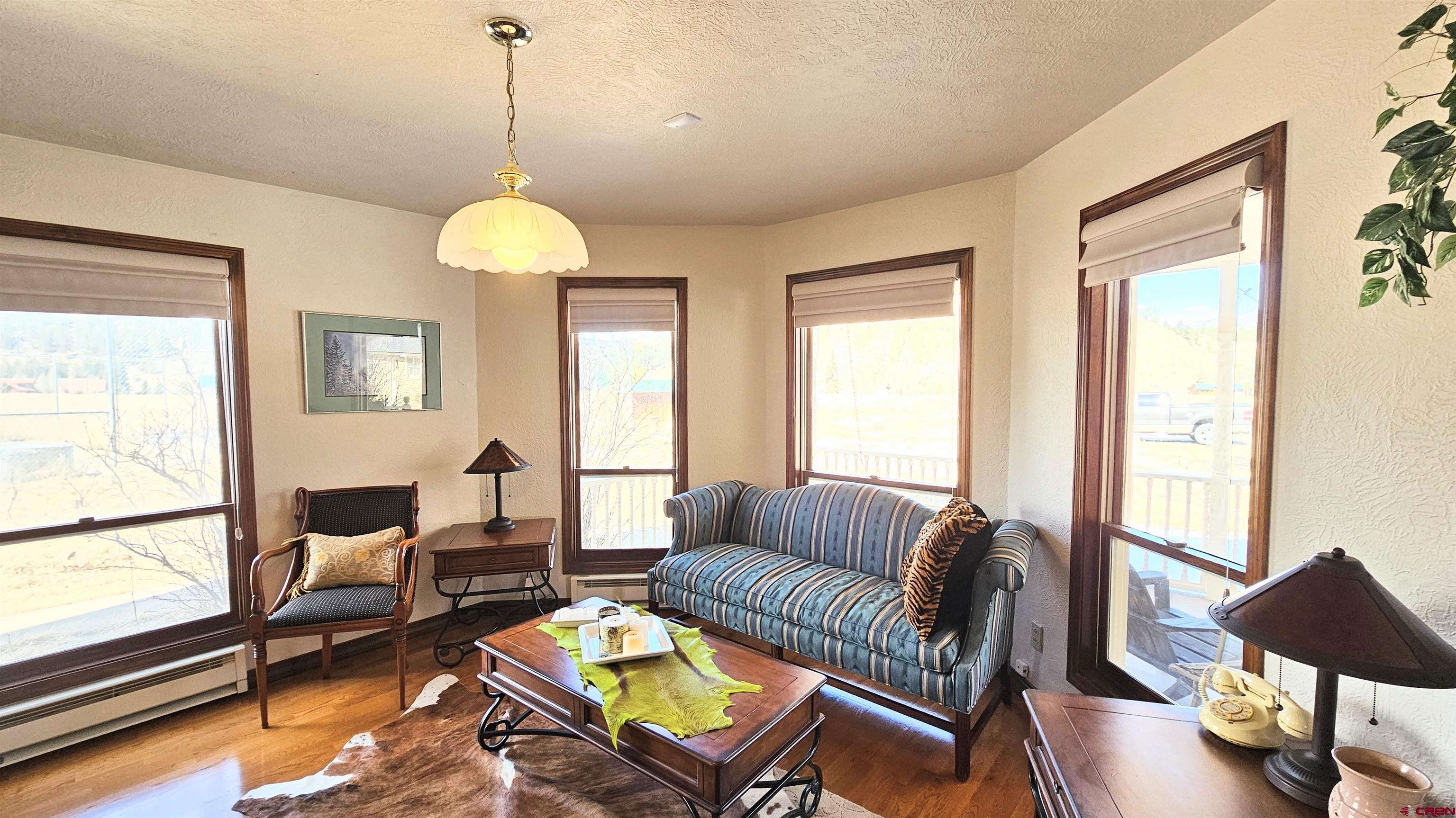 Undisclosed Beaver Creek Road South Fork, CO 81154 - Photo 16 of 26 a living room with furniture and a window