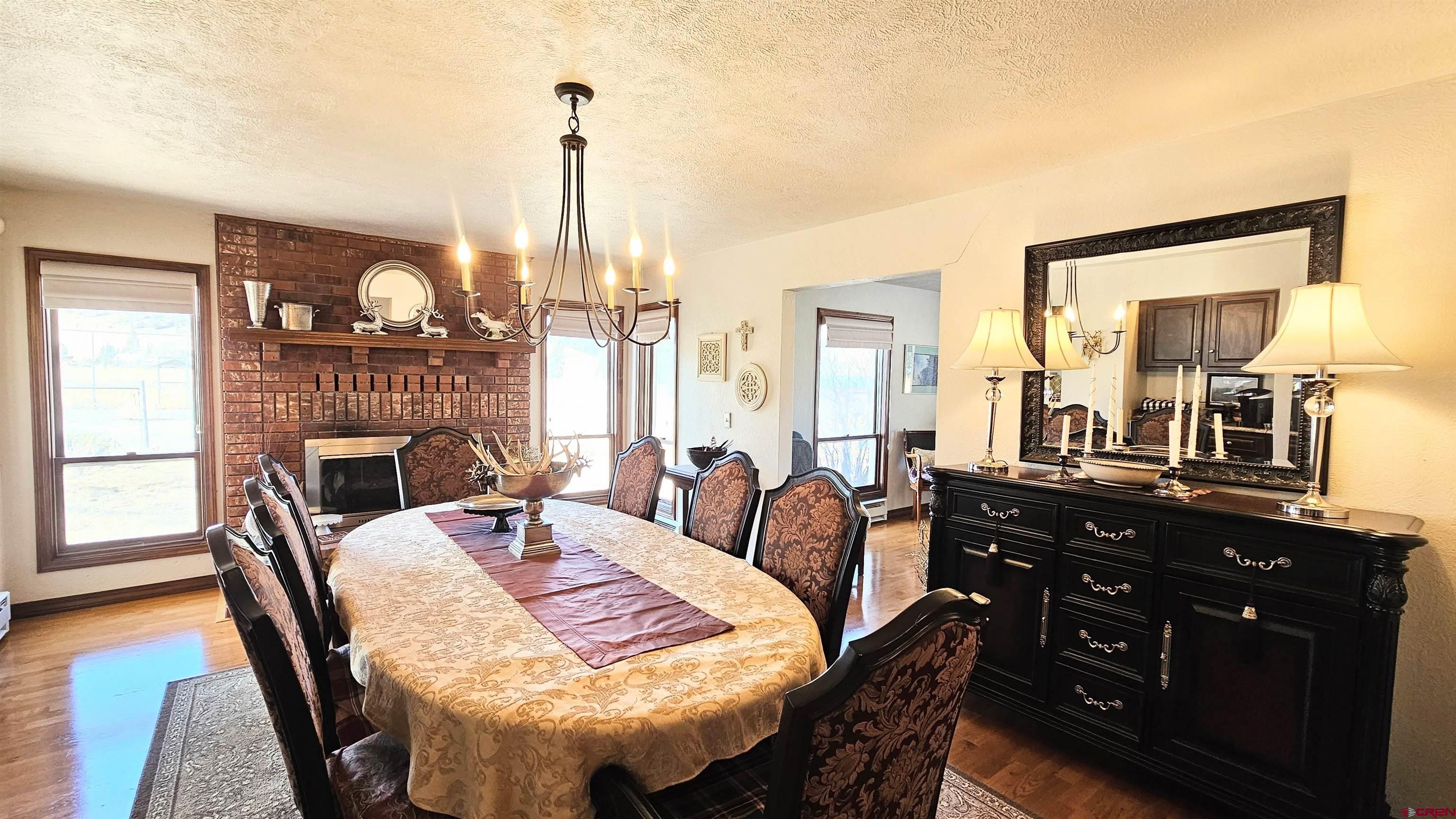 Undisclosed Beaver Creek Road South Fork, CO 81154 - Photo 17 of 26 a view of a dining room with furniture