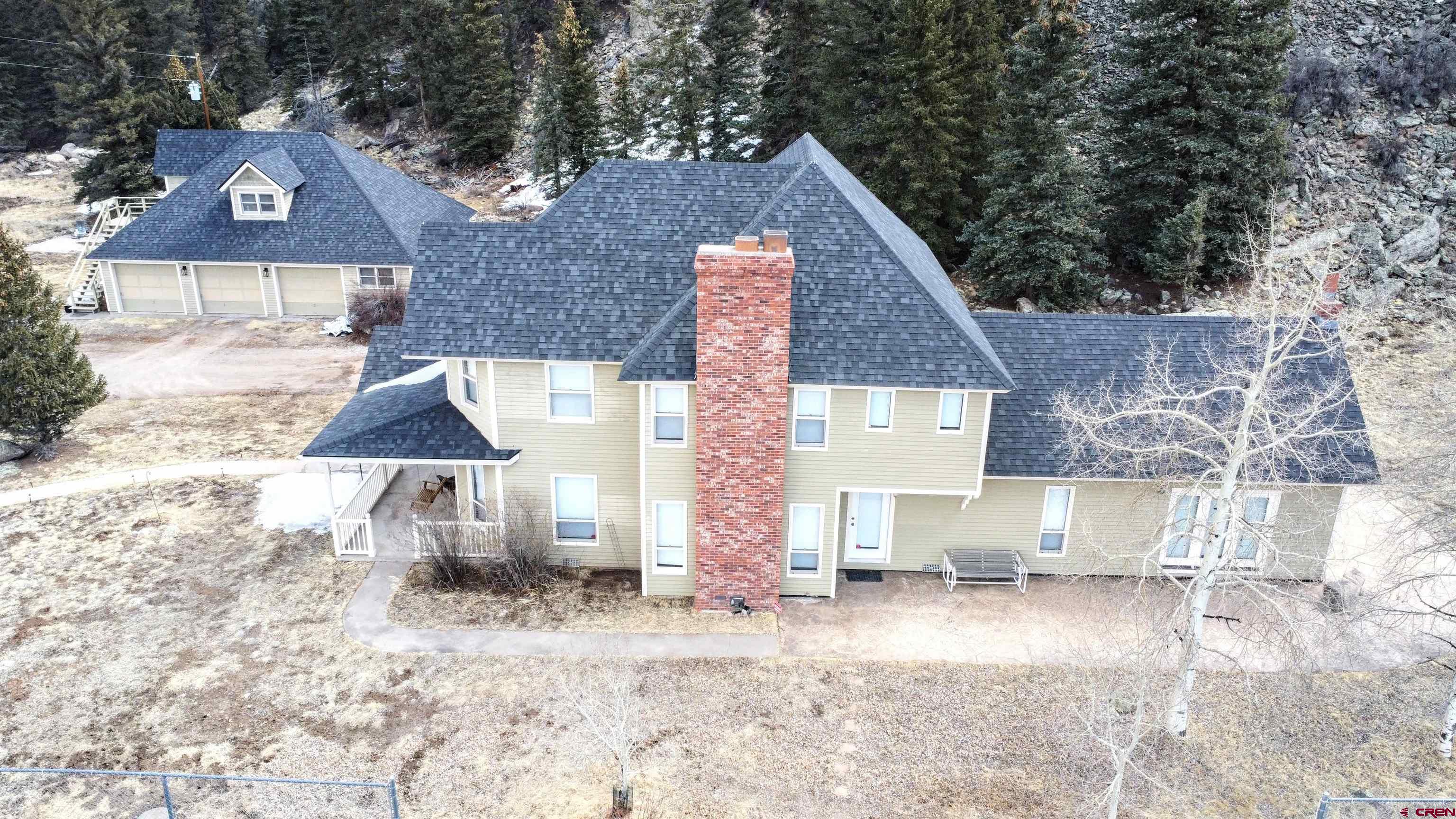 202 County Road 20 South Fork, CO 81154 - Photo 17 of 26 a front view of a house with garden