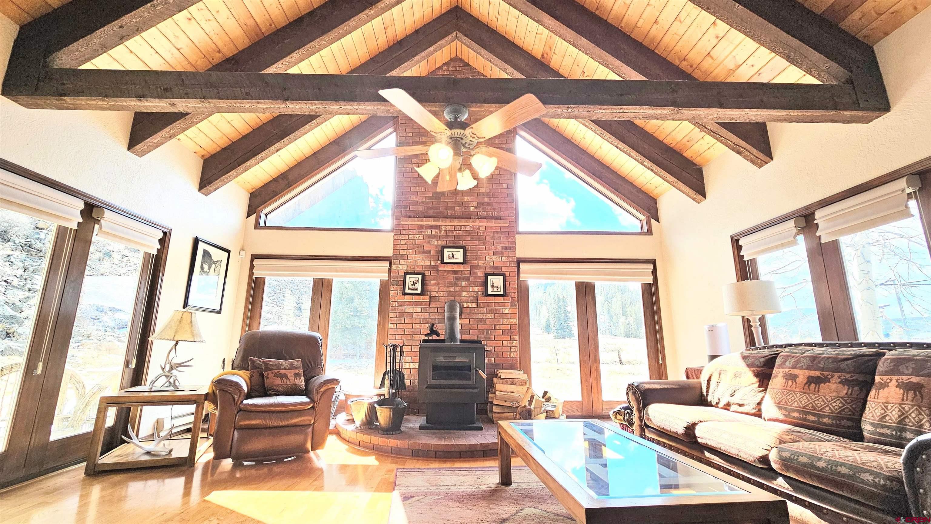 202 County Road 20 South Fork, CO 81154 - Photo 5 of 26 a living room with furniture and a large window