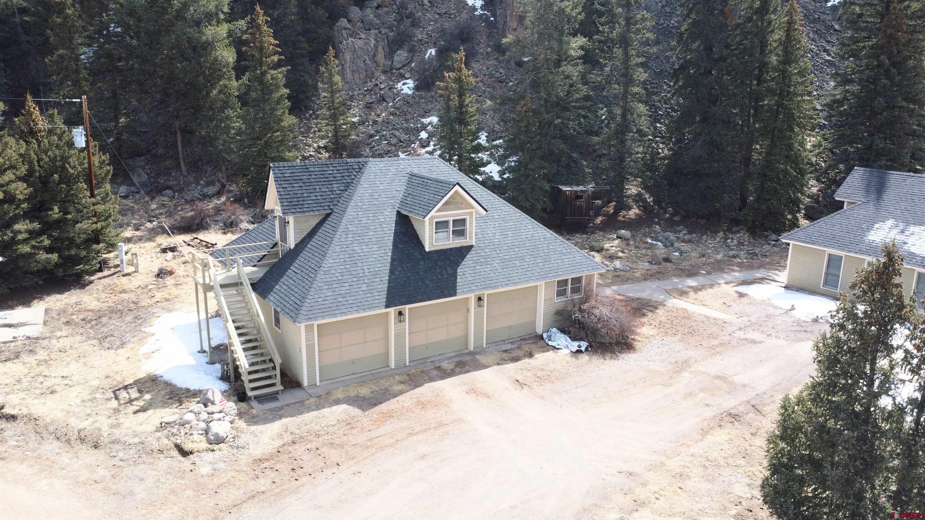 Undisclosed Beaver Creek Road South Fork, CO 81154 - Photo 7 of 26 a view of a house with a yard covered in snow