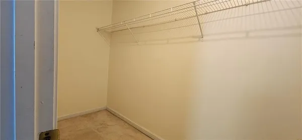 a living room with couch and a window