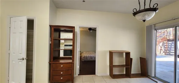 a bathroom with a tub and shower