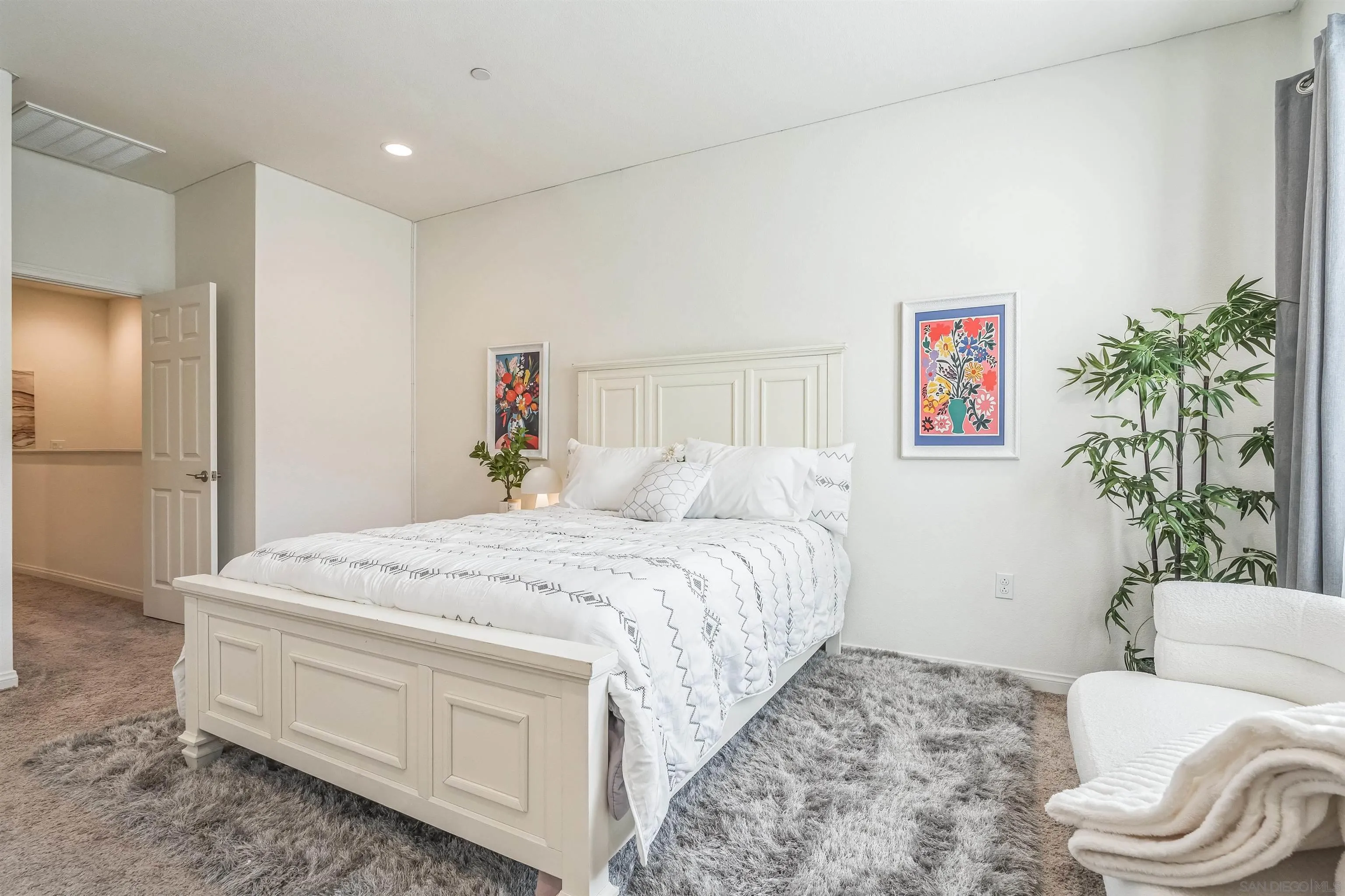 2018 Barite Street Spring Valley, CA 91977 - Photo 36 of 47 a bed room with a bed and a couch