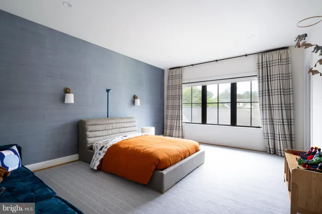 a kitchen with a stove microwave and cabinets