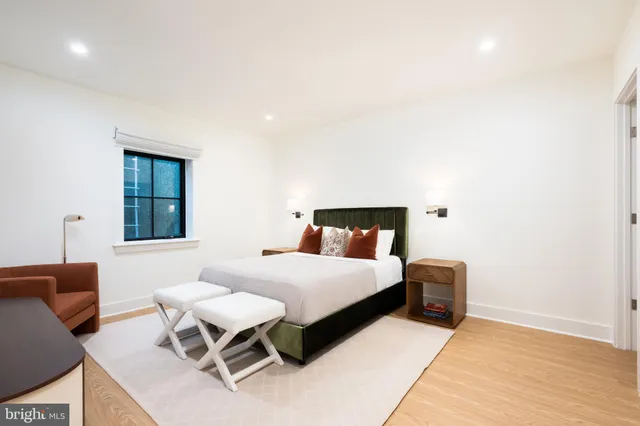 a view of a house with a backyard porch and sitting area