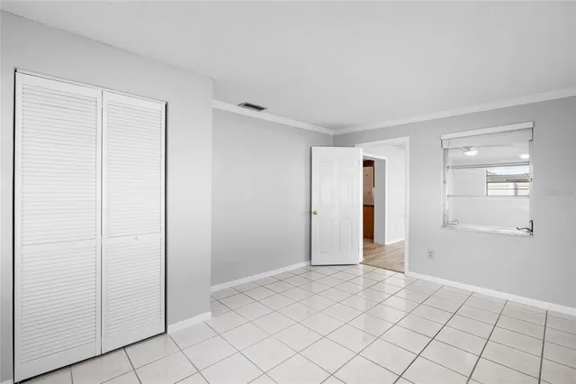 a view of an empty room and window