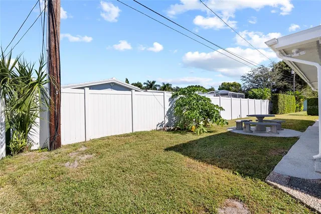 a view of a back yard of the house