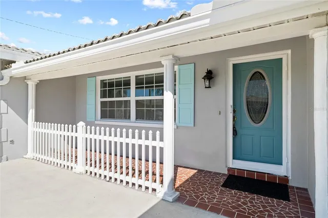 a view of a house with a door and a window