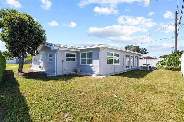a view of a house with swimming pool