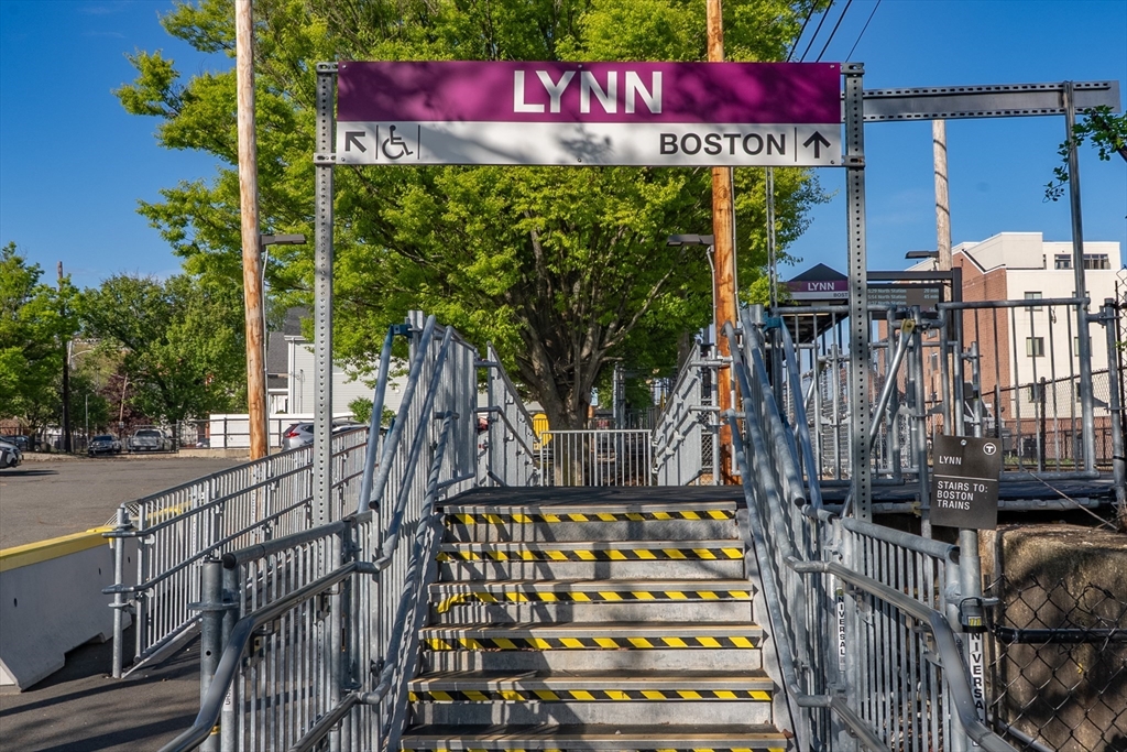 285 Lynn Shore Drive, Unit 710 Lynn, MA 01902 - Photo 20 of 26 a view of an outdoor sitting area with wooden fence