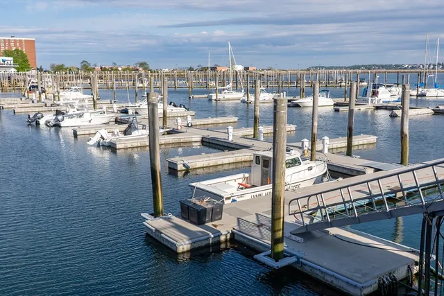 an aerial view of a house with a ocean view