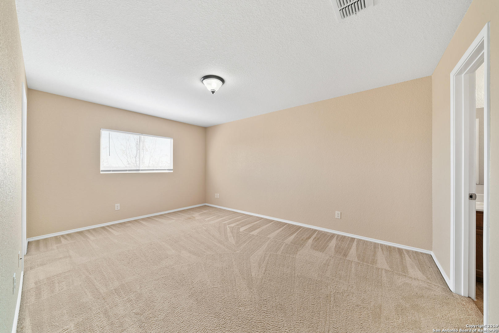 264 Cactus Patch Schertz, TX 78154 - Photo 11 of 25 a view of an empty room with a window