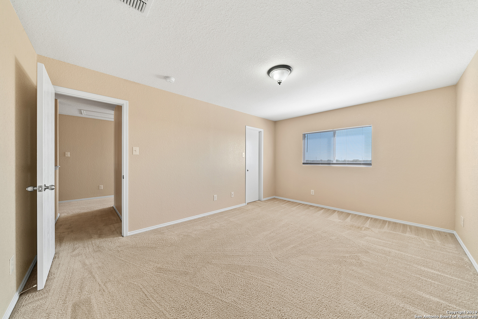 264 Cactus Patch Schertz, TX 78154 - Photo 12 of 25 an empty room with a empty space and windows