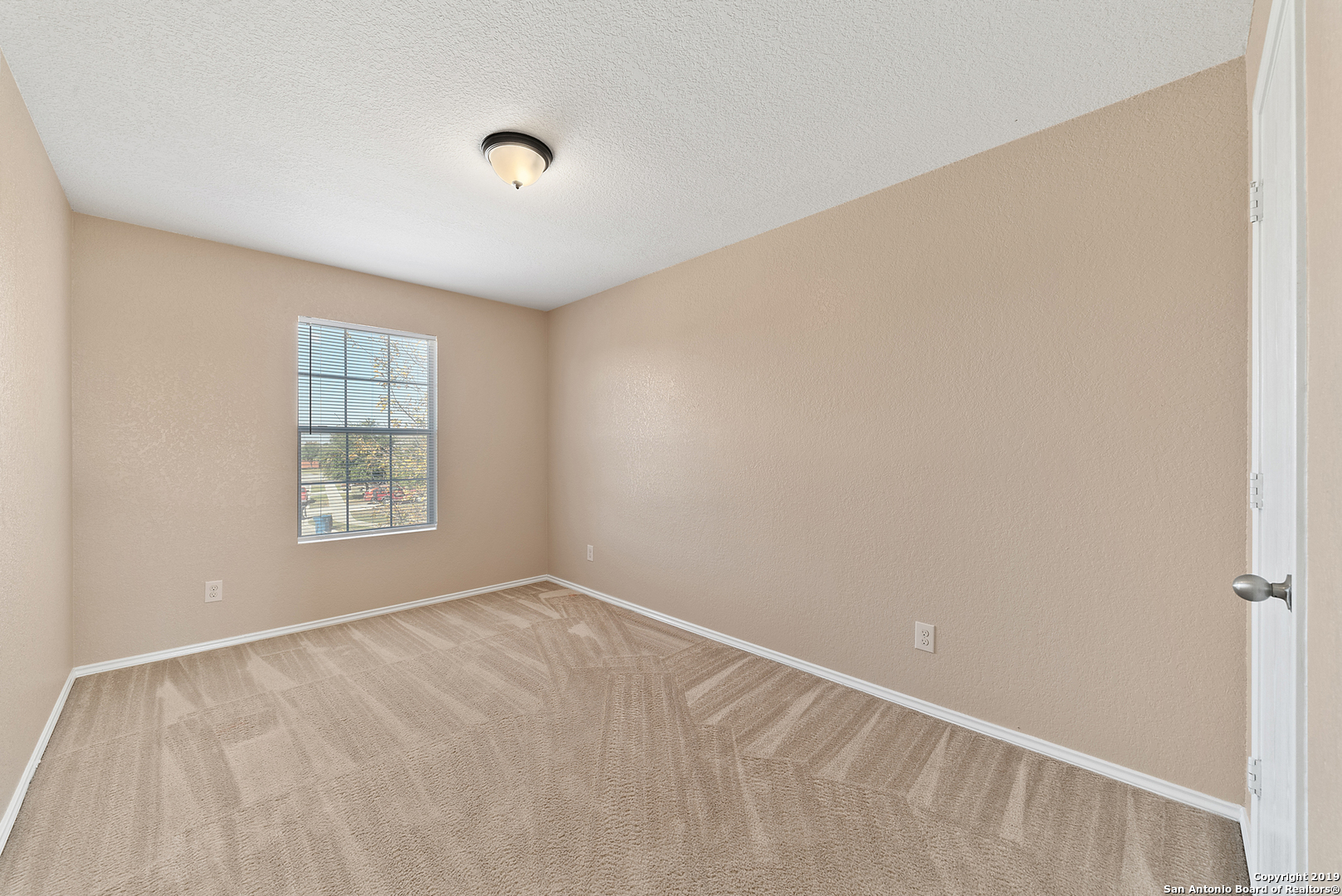 264 Cactus Patch Schertz, TX 78154 - Photo 18 of 25 a view of an empty room with a window