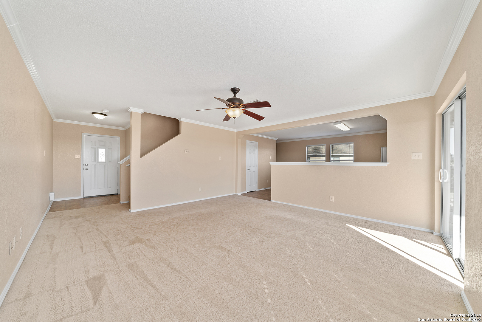264 Cactus Patch Schertz, TX 78154 - Photo 4 of 25 a view of a livingroom with a ceiling fan and window