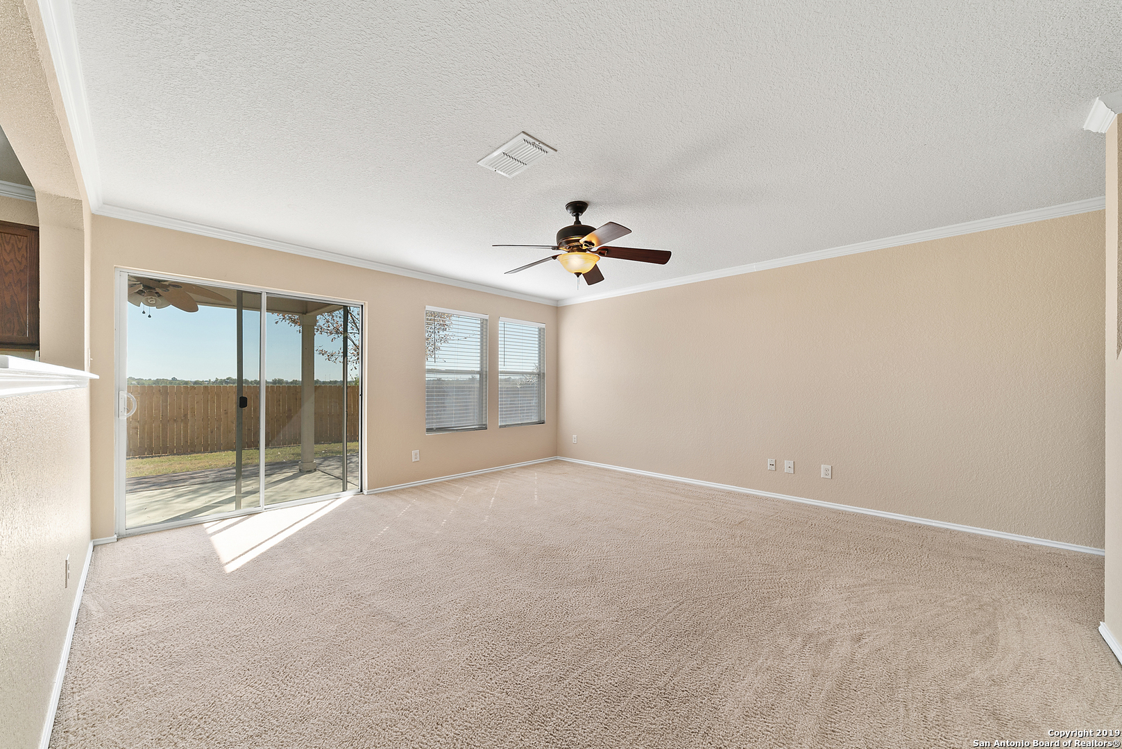 264 Cactus Patch Schertz, TX 78154 - Photo 6 of 25 a view of empty room with wooden floor and fan