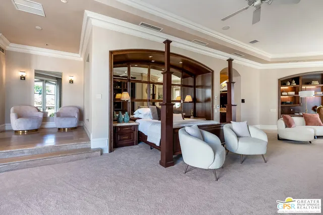 a bathroom with a sink a vanity and a large mirror