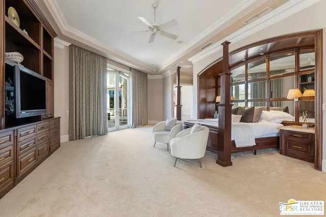 a view of a swimming pool with outdoor seating