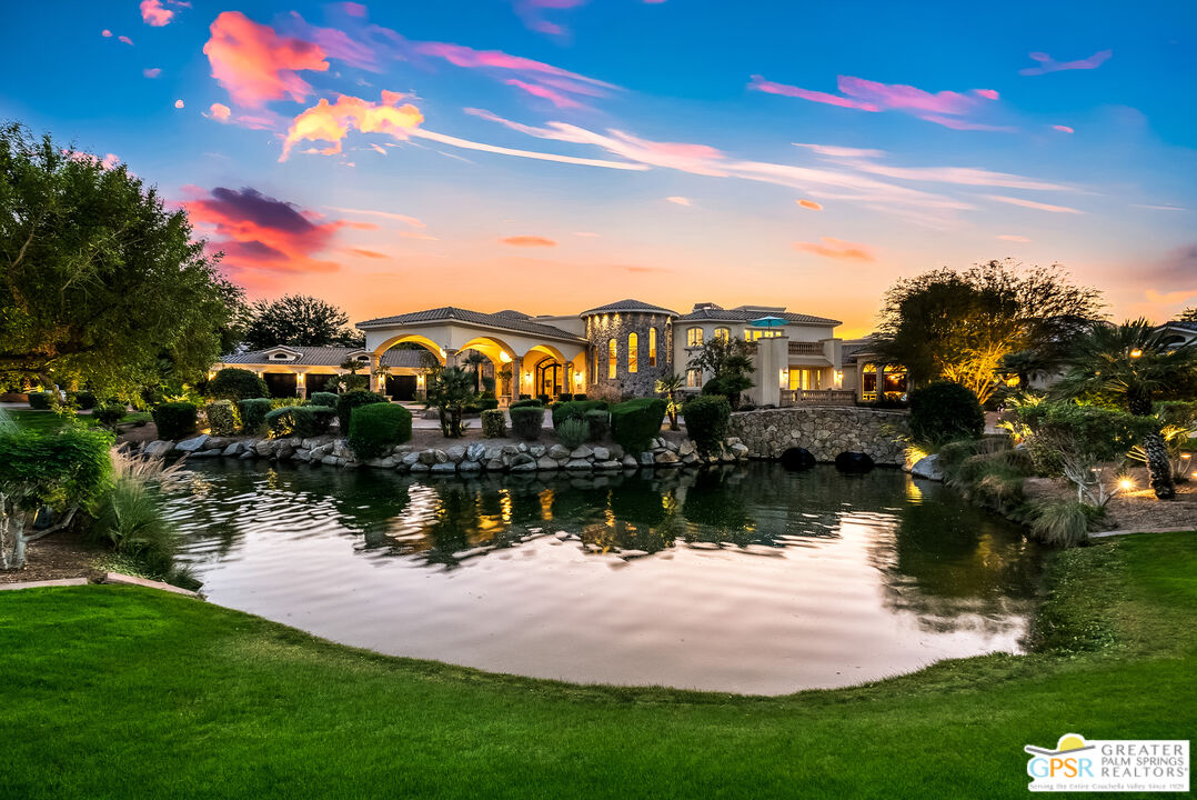 1 St Petersburg Court Rancho Mirage, CA 92270 - Photo 4 of 73 a view of residential house with outdoor space and lake view