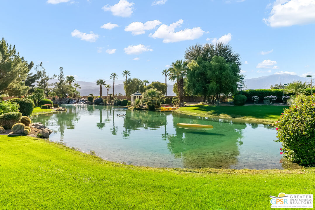1 St Petersburg Court Rancho Mirage, CA 92270 - Photo 48 of 73 a view of a lake with houses
