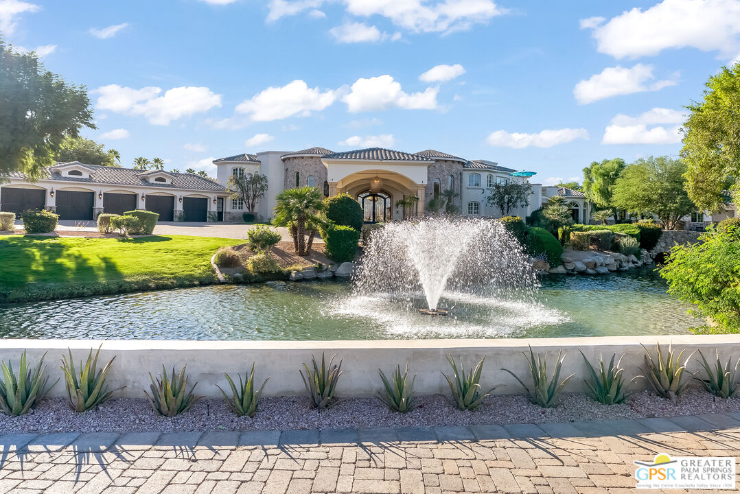 1 St Petersburg Court Rancho Mirage, CA 92270 - Photo 6 of 73 a view of a garden with a house