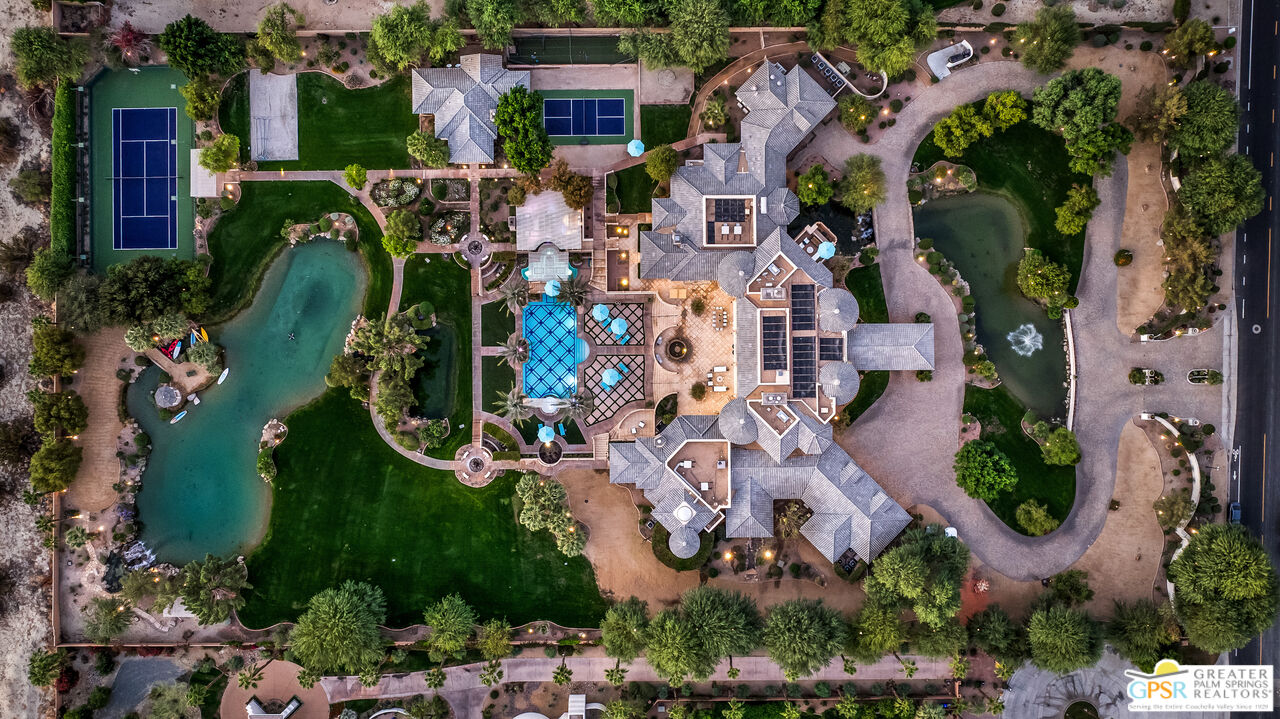 1 St Petersburg Court Rancho Mirage, CA 92270 - Photo 8 of 73 an aerial view of residential house with outdoor space and swimming pool