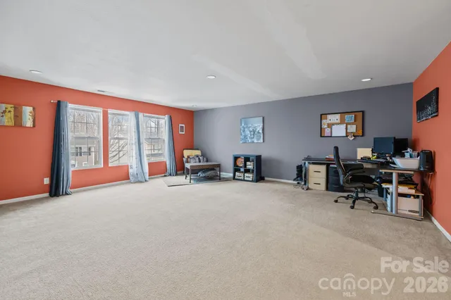 a view of a livingroom with furniture and a couch