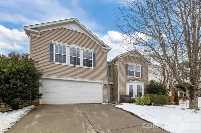 a view of swimming pool from a balcony