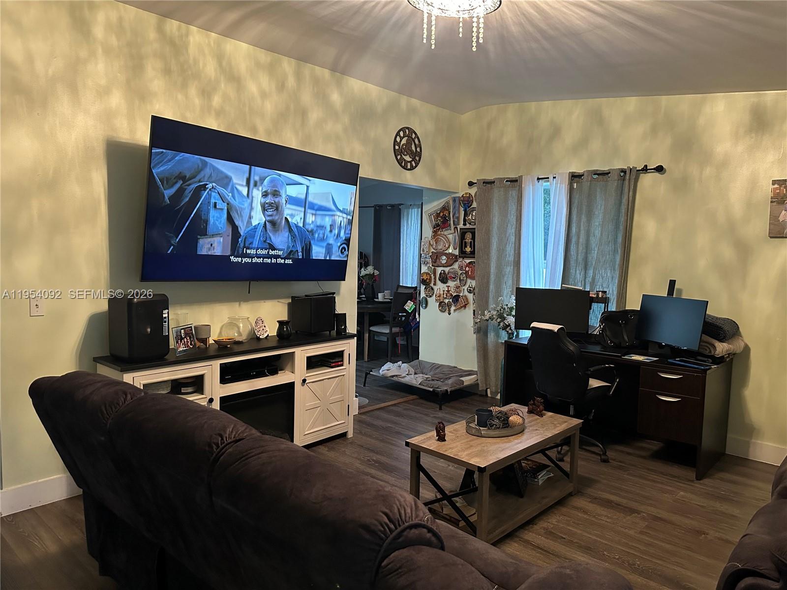 5700 Southwest 54th Terrace Davie, FL 33314 - Photo 14 of 49 a living room with furniture pool table and wall paintings