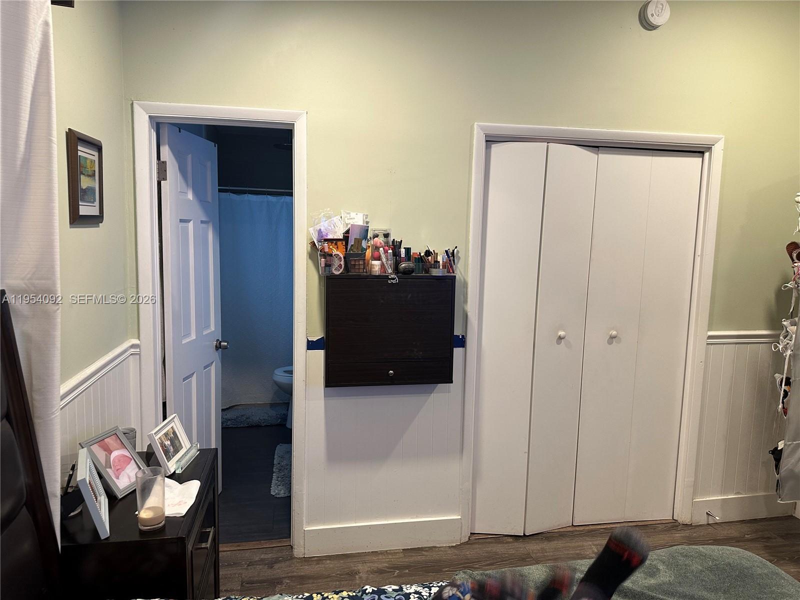5700 Southwest 54th Terrace Davie, FL 33314 - Photo 21 of 49 a view of hallway with furniture and wooden floor