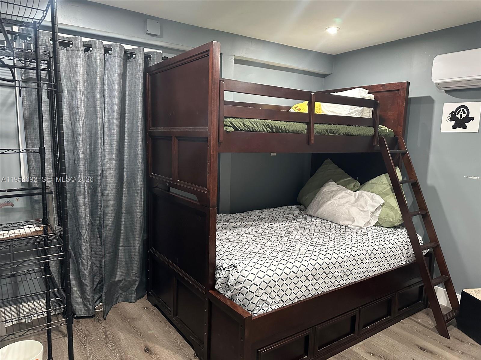 5700 Southwest 54th Terrace Davie, FL 33314 - Photo 30 of 49 a bedroom with a bed and a walk in closet