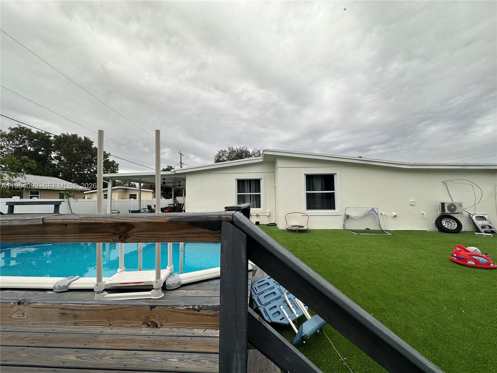 5700 Southwest 54th Terrace Davie, FL 33314 - Photo 32 of 49 a view of a backyard with a garden and plants