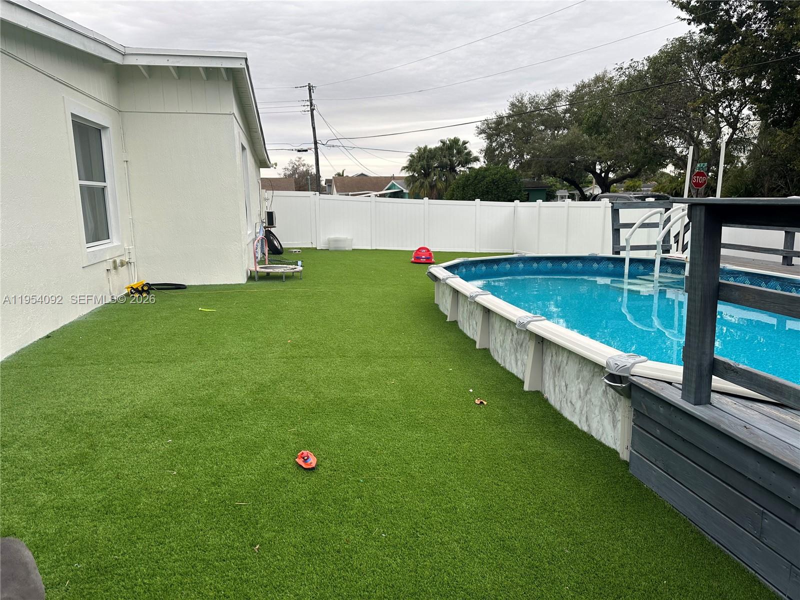 5700 Southwest 54th Terrace Davie, FL 33314 - Photo 39 of 49 a view of a backyard with sitting area