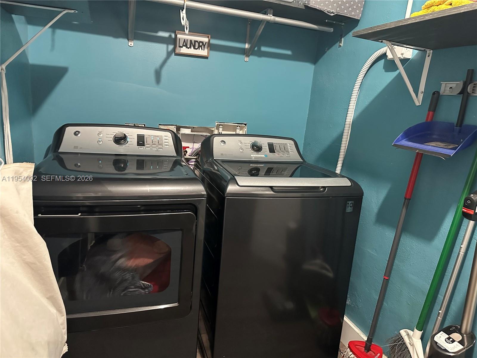 5700 Southwest 54th Terrace Davie, FL 33314 - Photo 48 of 49 a utility room with dryer and washer