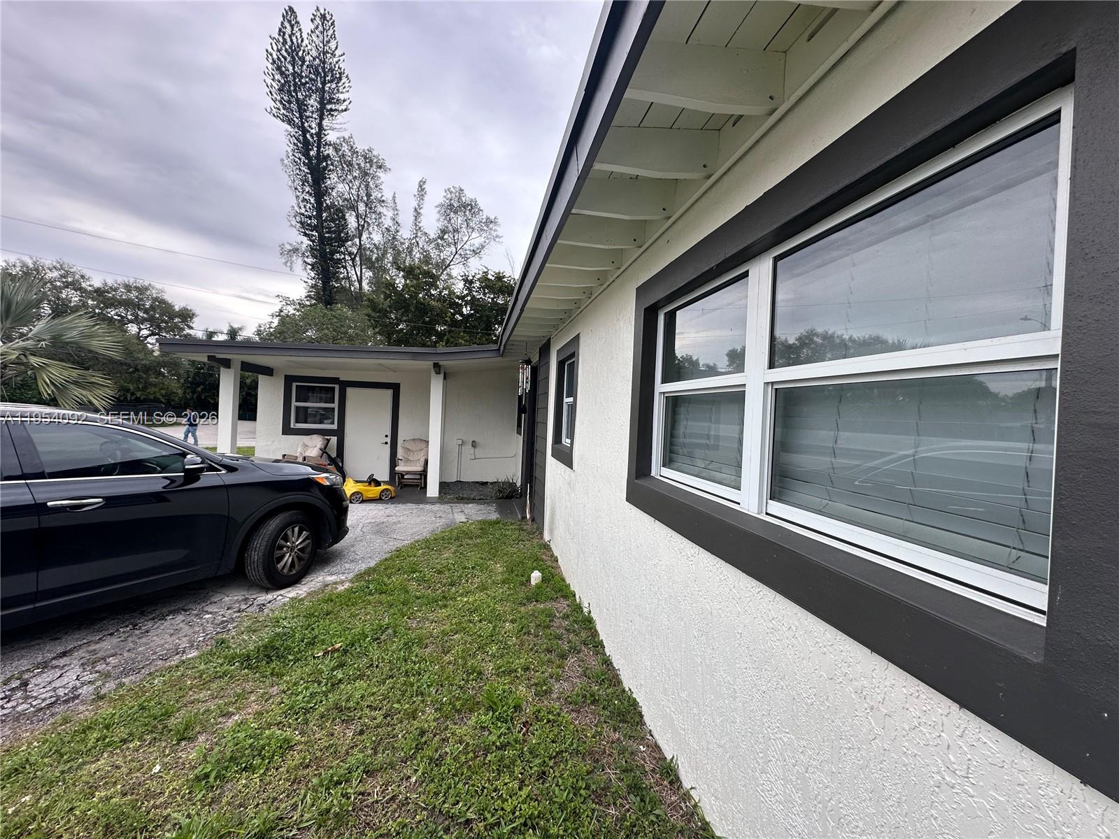 5700 Southwest 54th Terrace Davie, FL 33314 - Photo 5 of 49 a view of car parked in front of house