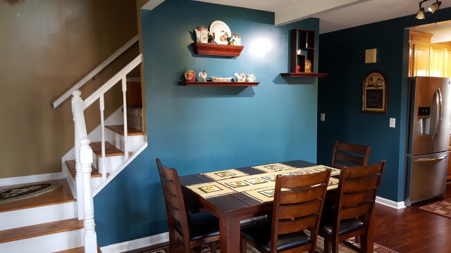 295 North Cross Road Gray, GA 31032 - Photo 11 of 26 a view of a dining room with furniture and wooden floor