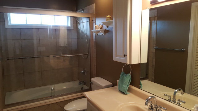 295 North Cross Road Gray, GA 31032 - Photo 17 of 26 a bathroom with a sink and a shower