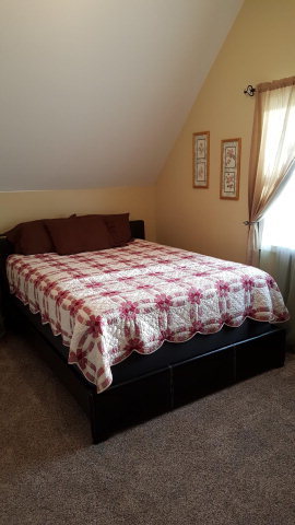 295 North Cross Road Gray, GA 31032 - Photo 21 of 26 a bedroom with bed and window