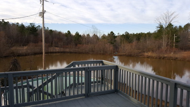 295 North Cross Road Gray, GA 31032 - Photo 6 of 26 a view of a street next to a lake view