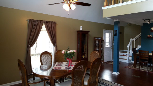 295 North Cross Road Gray, GA 31032 - Photo 10 of 26 a dining room with furniture and wooden floor