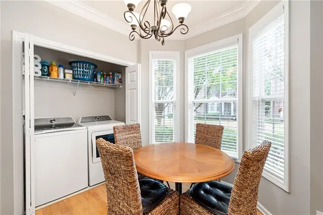 a view of a dining room with furniture window and outside view
