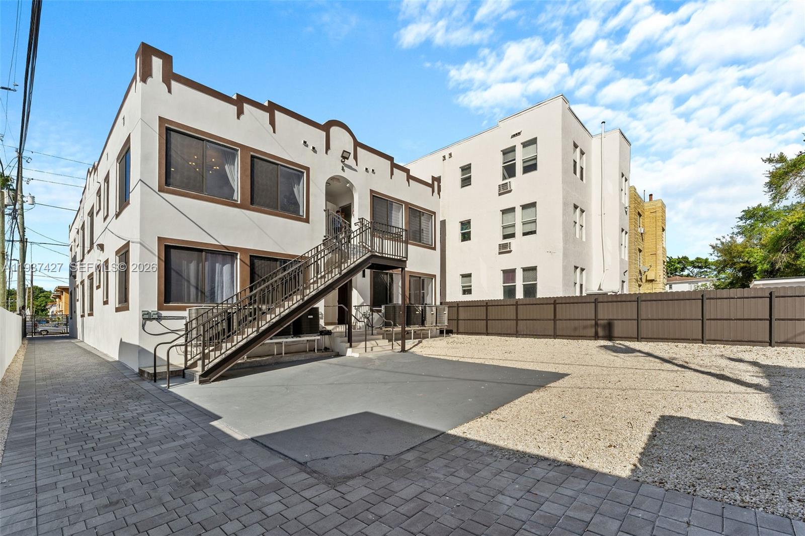 1144 Southwest 4th Street, Unit 8 Miami, FL 33130 - Photo 16 of 16 a view of a building with many windows