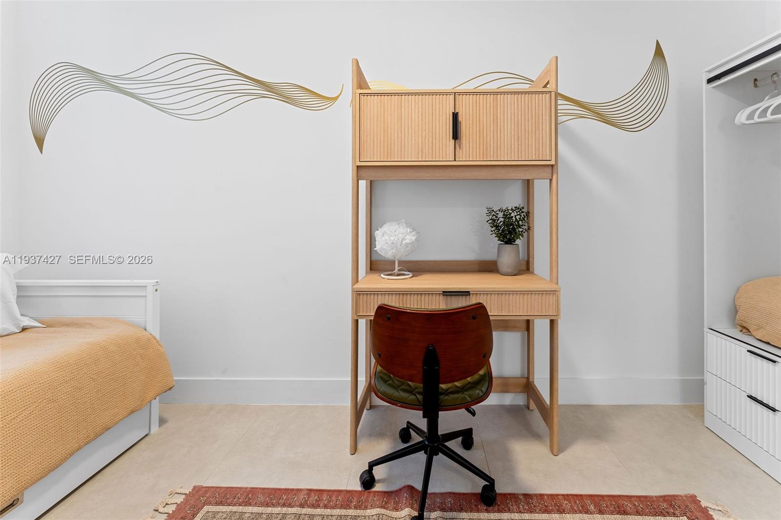 1144 Southwest 4th Street, Unit 8 Miami, FL 33130 - Photo 9 of 16 a bedroom with a bed and a table in it